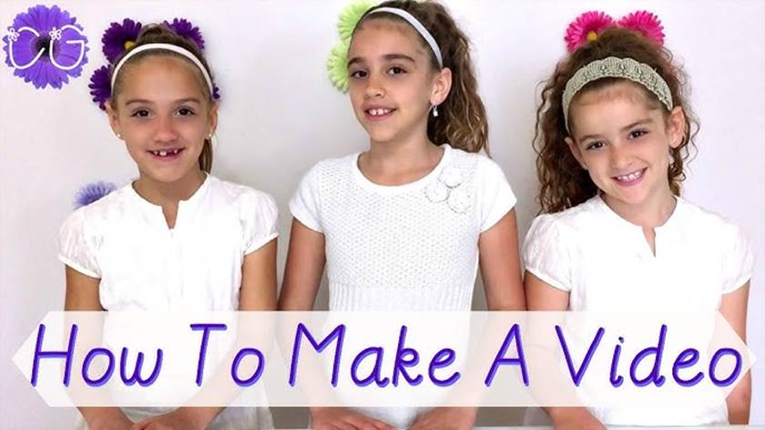 Three young girls with headbands and flowers in their hair stand together, smiling at the camera in white outfits. Text at the bottom reads, How To Make A Video—a perfect guide for young creators exploring safe kids content creation.